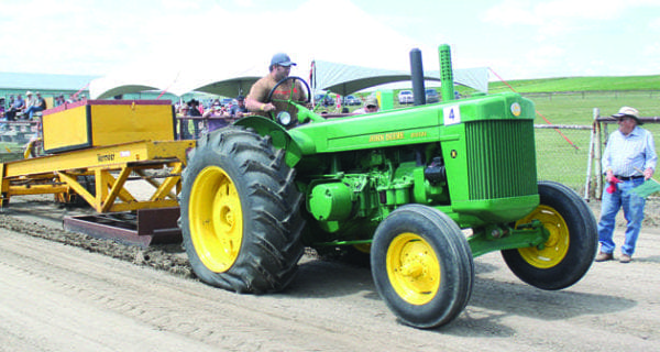 Antique tractors roar to life in Denzil